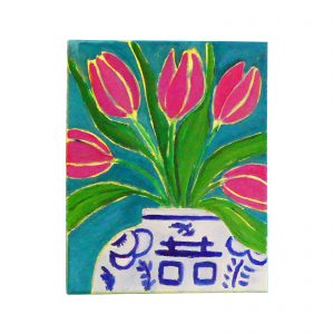 Pink tulip in blue white vase